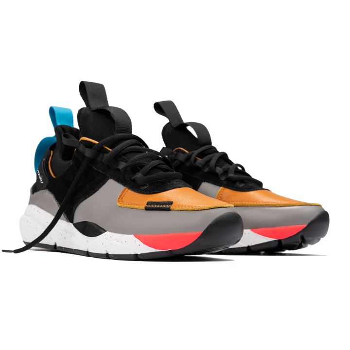 Front 3/4 view, The Contera Kalahari is a Runner with grey leather black suede and tabaco orange leather, Blue webbing heel pull, Black webbin tongue pull, Black webbing lace system, painted eva midsole ande black rubber outsole.