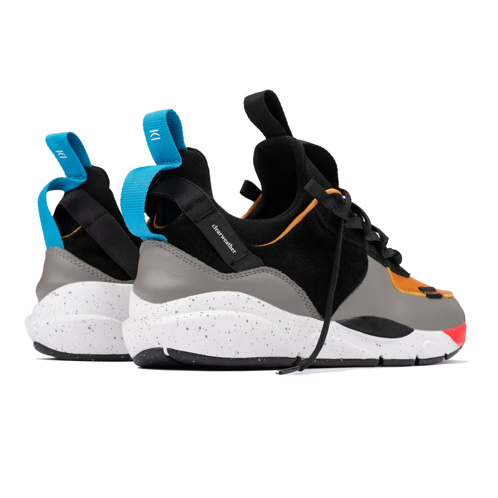 Back 3/4 view, The Contera Kalahari is a Runner with grey leather black suede and tabaco orange leather, Blue webbing heel pull, Black webbin tongue pull, Black webbing lace system, painted eva midsole ande black rubber outsole.