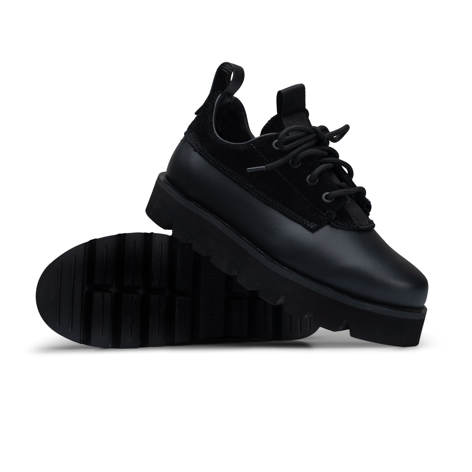 Black sneakers on a white background