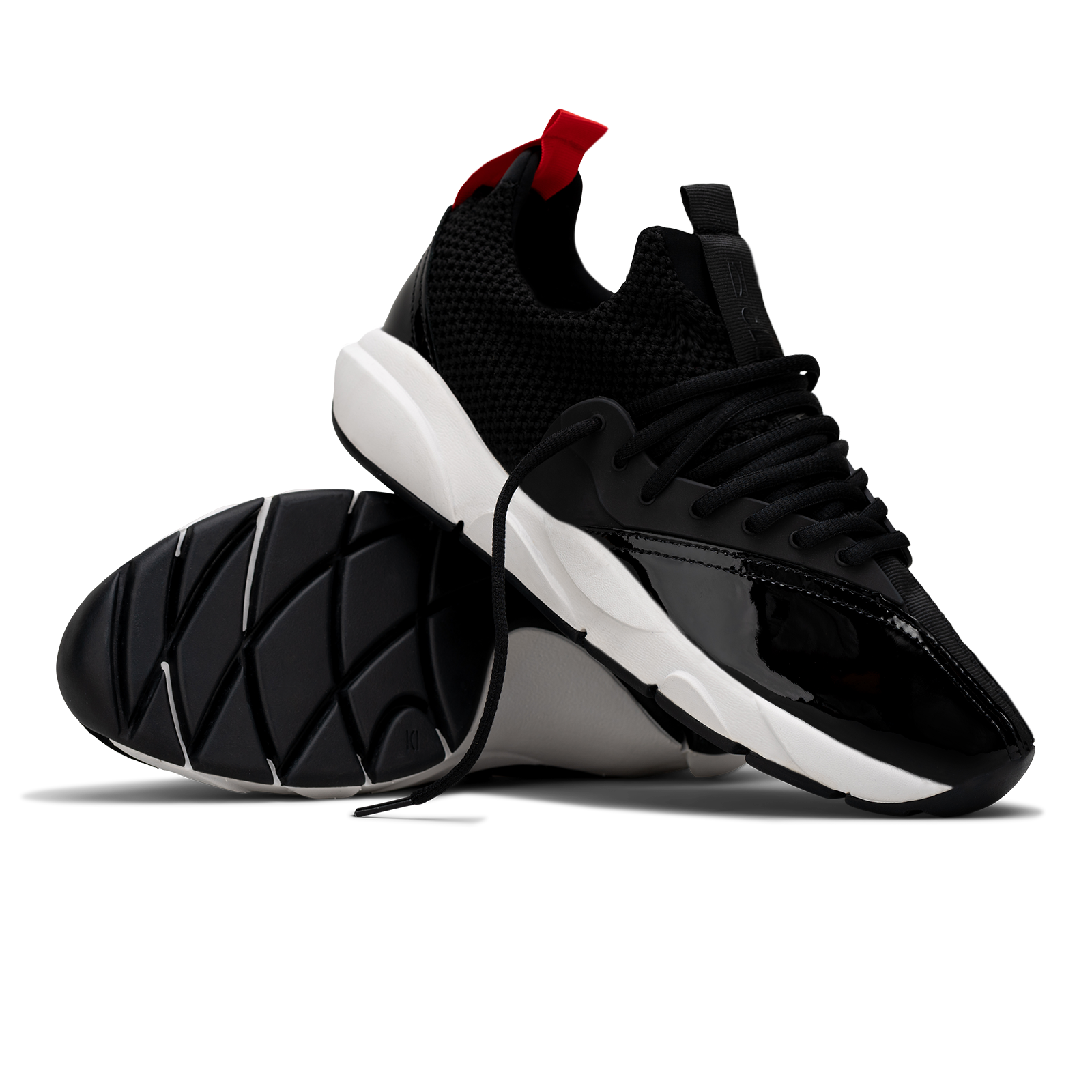 stylized view, Cloudstryk Advantage is a runner with Black patent leather and suede overlays zoom mesh underlays, red heel pull molded lace holder, white eva midsol and a translucent black rubber outsole.