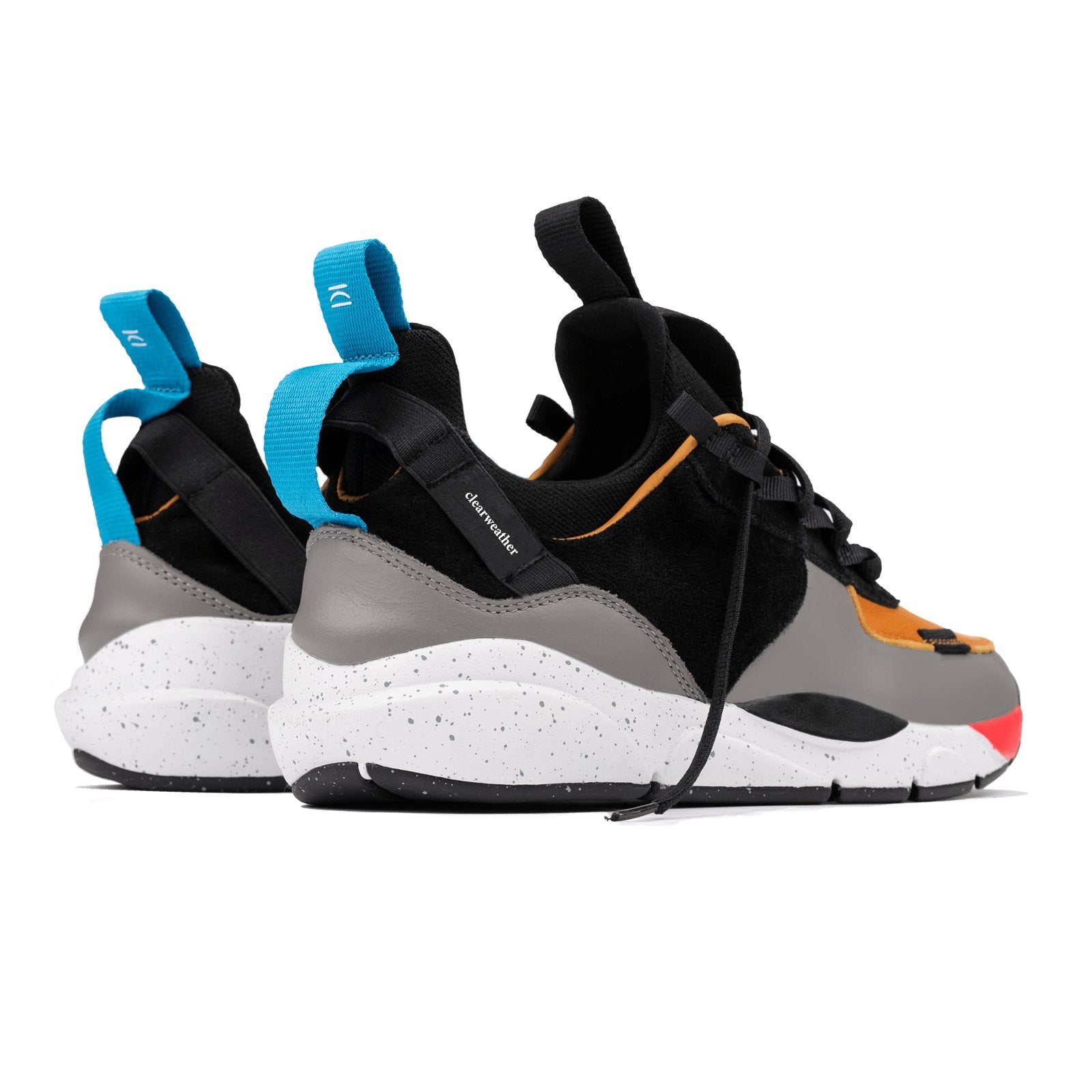 Back 3/4 view, The Contera Kalahari is a Runner with grey leather black suede and tabaco orange leather, Blue webbing heel pull, Black webbin tongue pull, Black webbing lace system, painted eva midsole ande black rubber outsole.