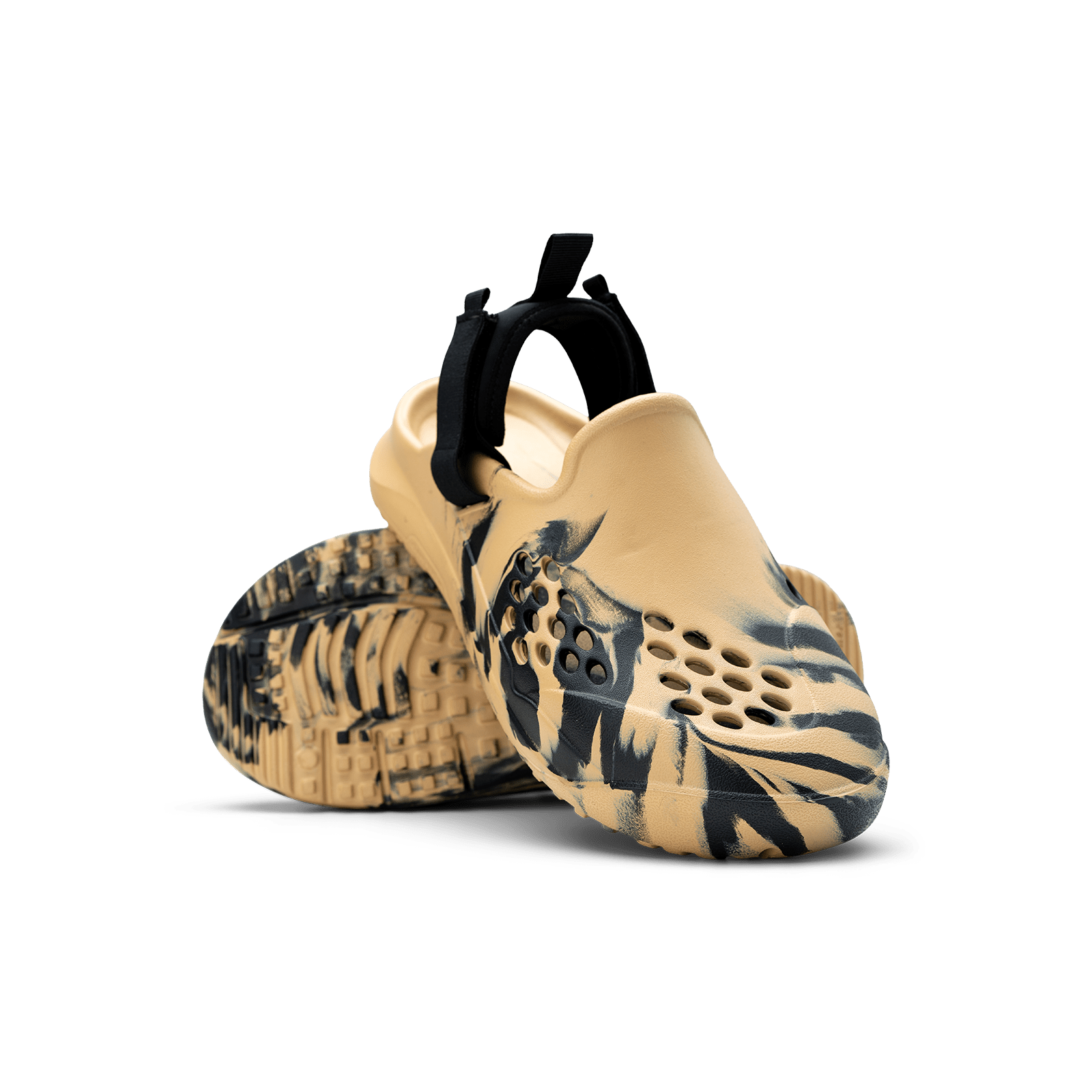 Beige and black clogs on a white background