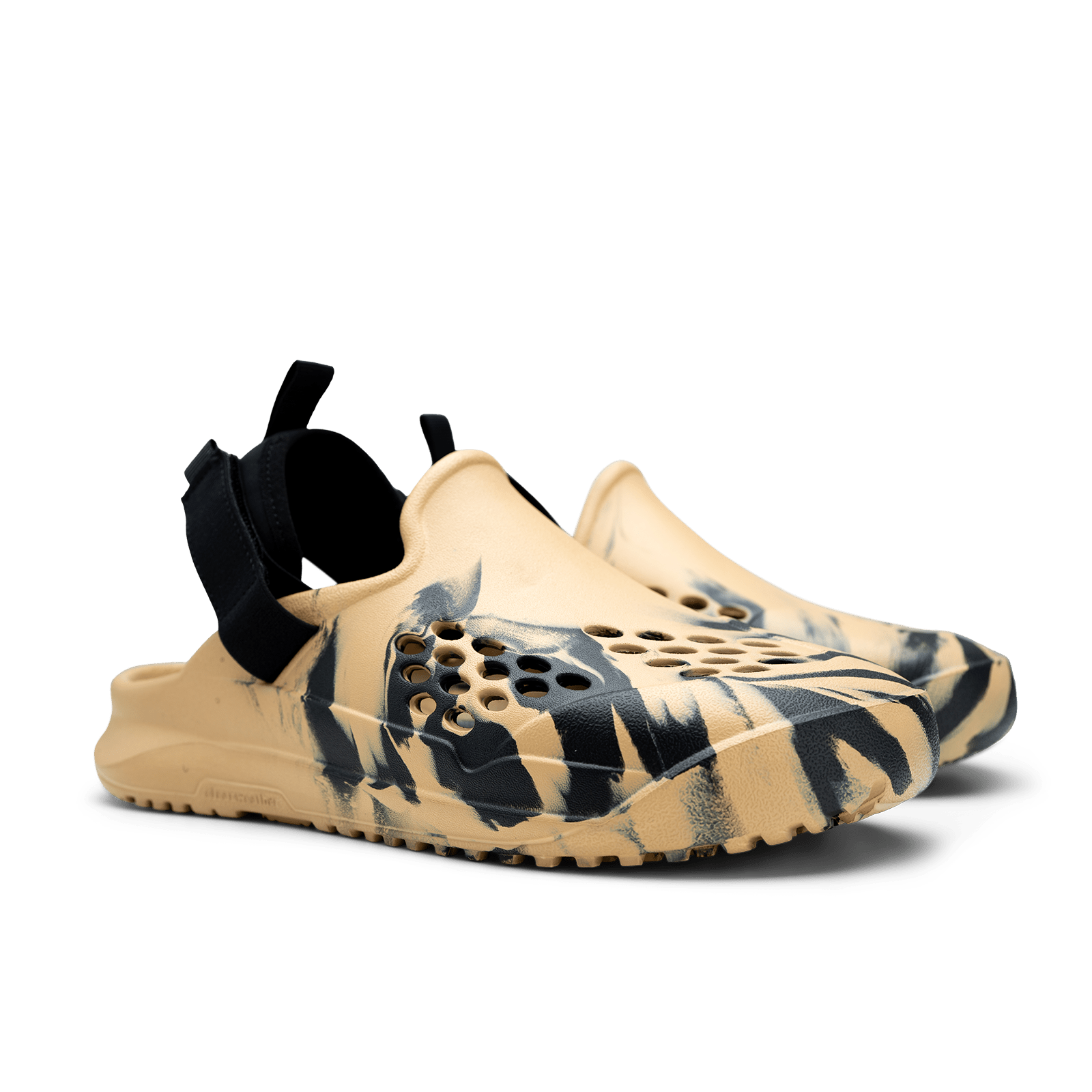 Beige and black athletic shoe on a white background