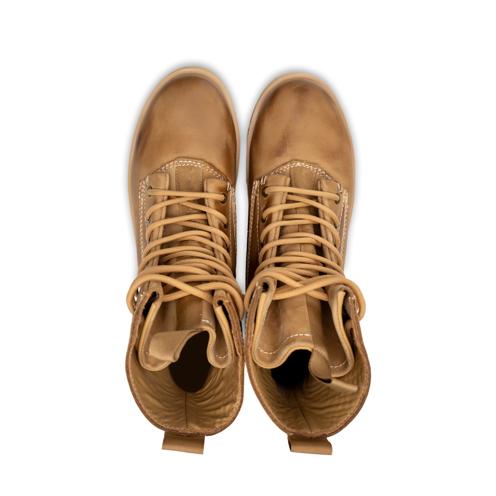 Pair of brown leather boots on a white background