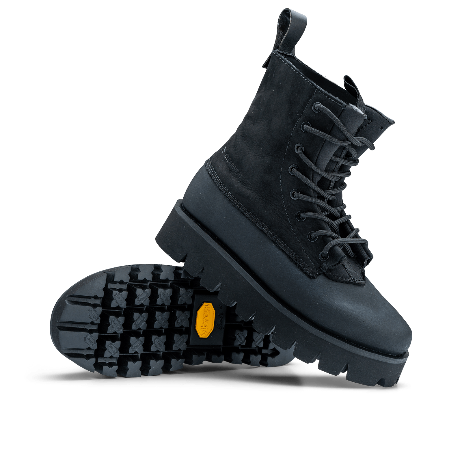 Black boot with a yellow sole on a white background