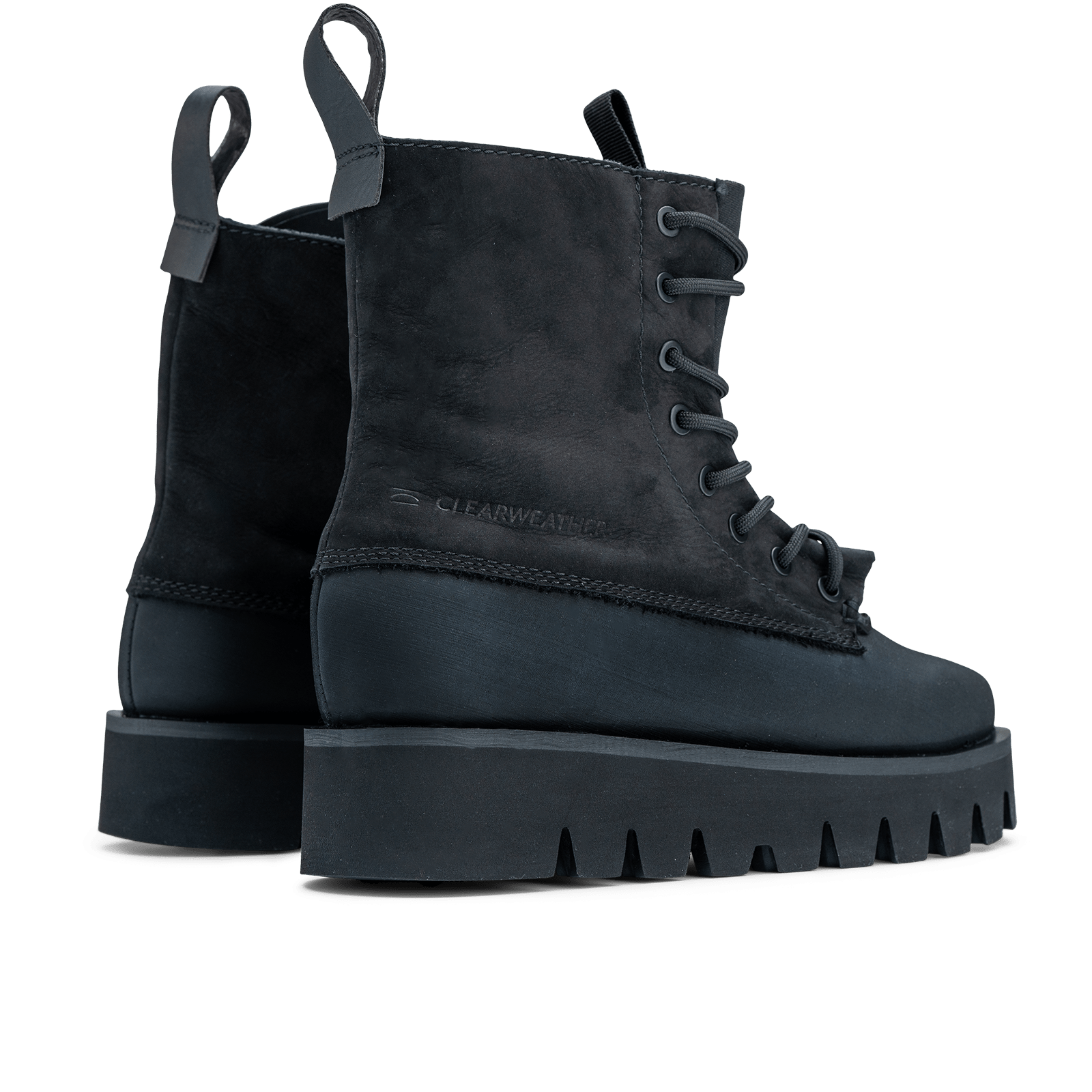 Black platform boots with a white background