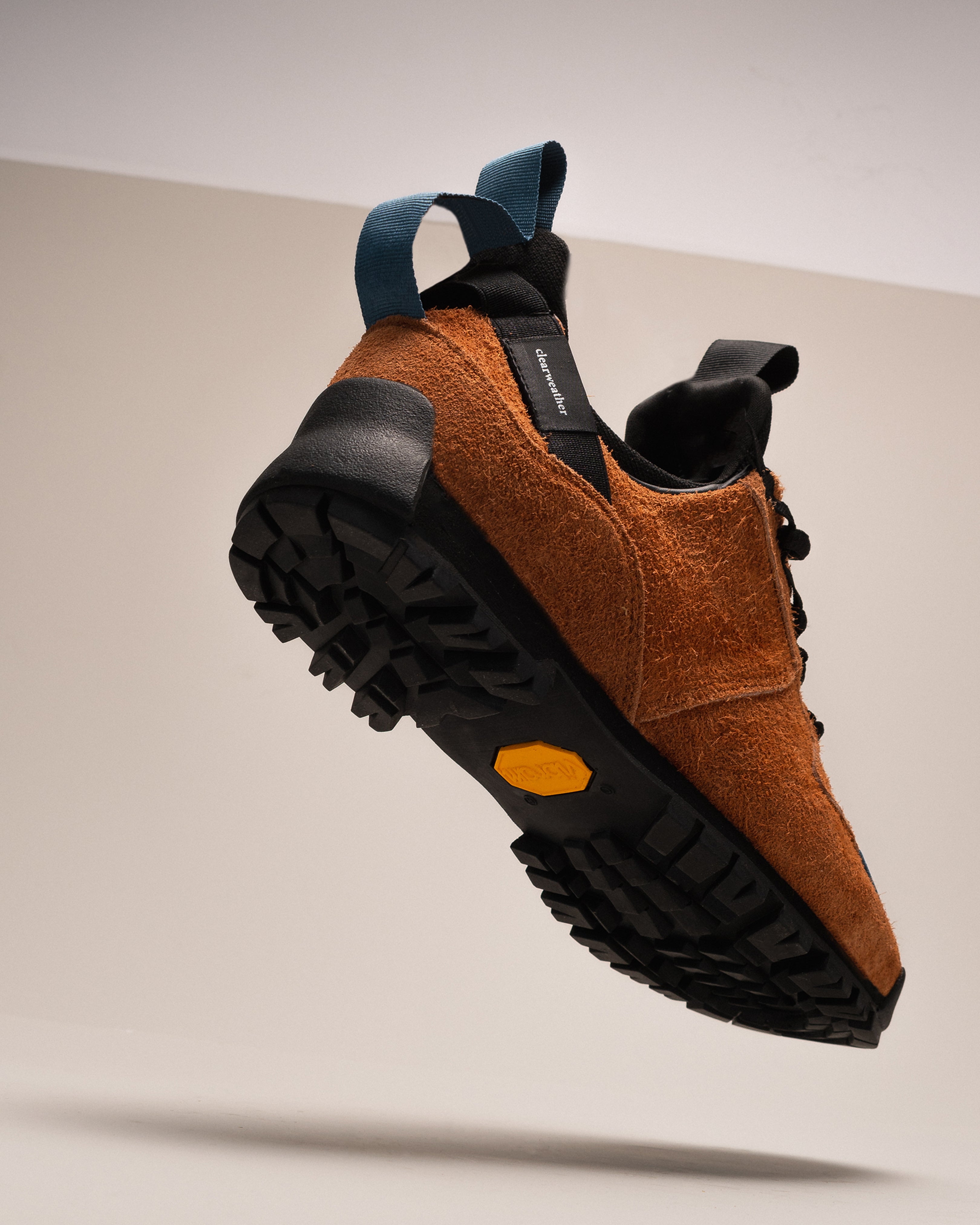 floating shot  / Approach / Auburn color features tabaco colored hairy suede upper, gross grain webbing for laces. helastic heel detail, stretch mesh internal bootie, vintrage vibram hiking outsole and eva midsole. 