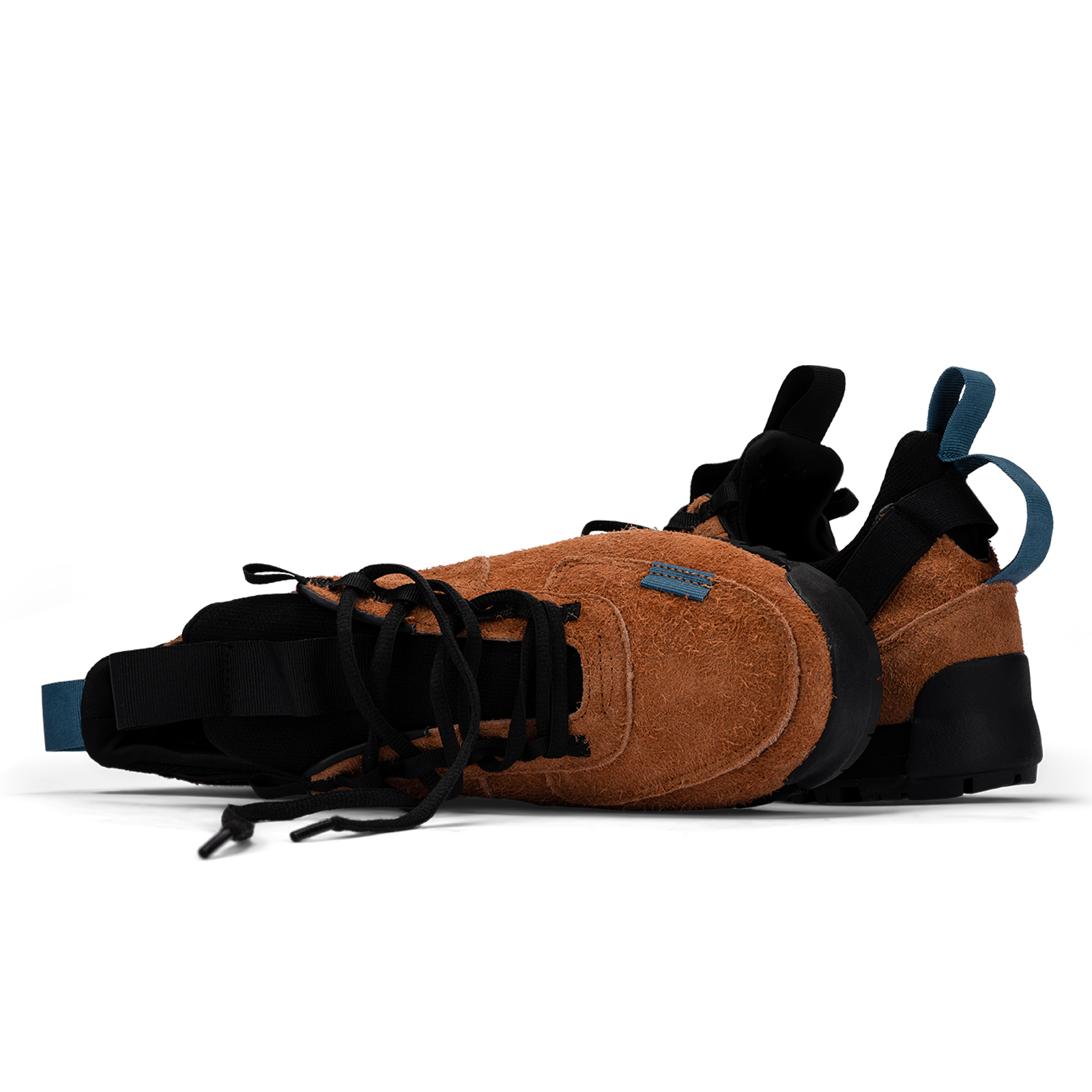 stylized shot  / Approach / Auburn color features tabaco colored hairy suede upper, gross grain webbing for laces. helastic heel detail, stretch mesh internal bootie, vintrage vibram hiking outsole and eva midsole. 