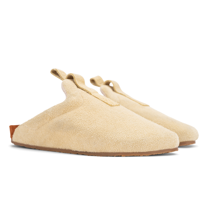 3/4 view beige suede upper, cork midsole wrapped in soft suede, Vibram sheet gum rubber outsole