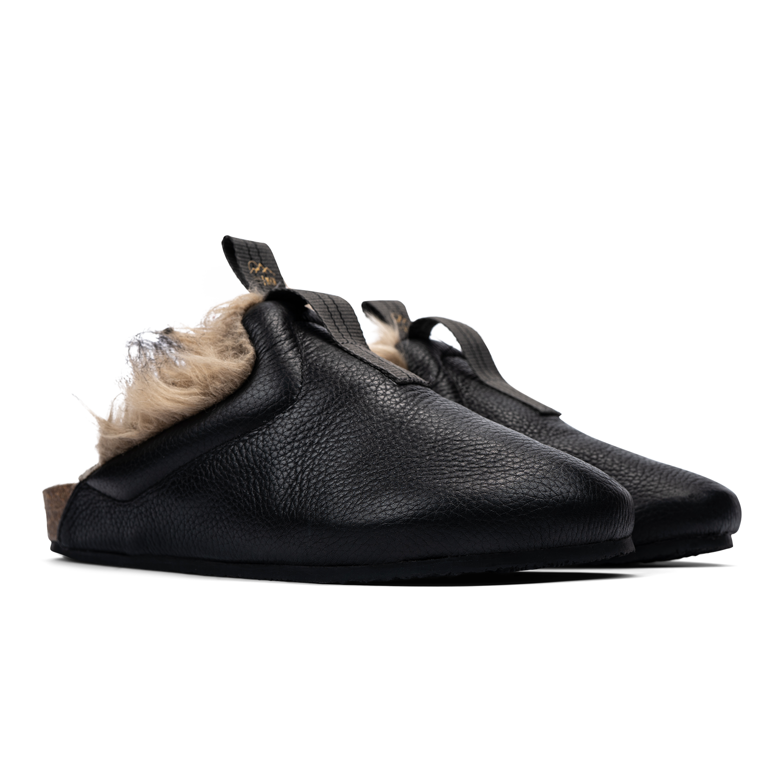 3/4 view  Bantha Himalya is a Mule with faux fur lining. - Black tumbled leather upper and vibram sheet rubber bottom.
