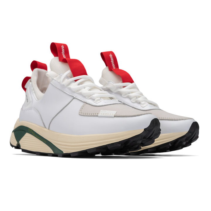 3/4 front view, Contera Cloud Forest is a runner with White fullgrain and Nubuck leather overlays White stretch mesh underlays, Red webbing heel and tongue pull, webbing lace system gream and green Virbam midsole and black vibram rubber outsole.