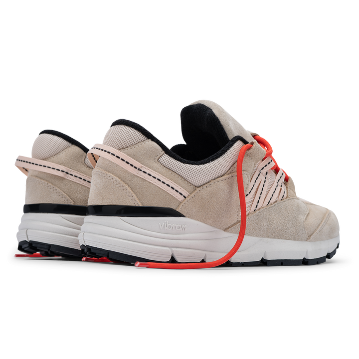 Altiutude / Safari back 3/4 view khaki suede / air mesh / webbing lace holder with orange lace on a vibram sole